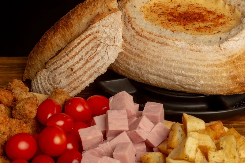 Käsefondue in Gruyères: Wo du das beste Fondue findest