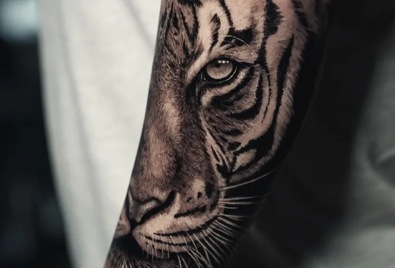 Tiger Tattoo Bedeutung: Was hinter dem kraftvollen Motiv steckt