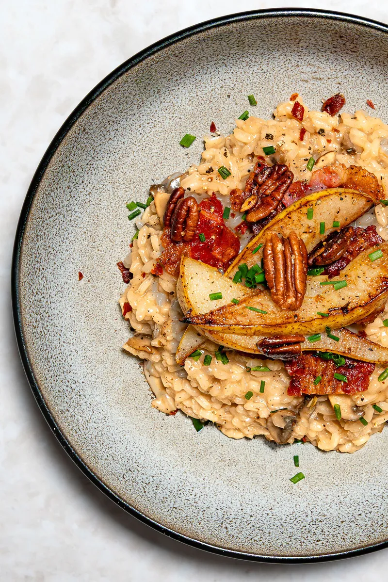 Pilzrisotto mit Bacon, karamellisierter Birne und NüssenNeu