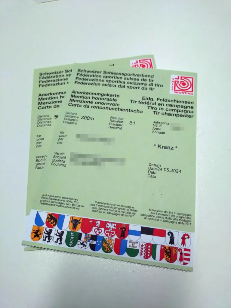 Anerkennungskarten und Feldmeisterschaftsmedaillen